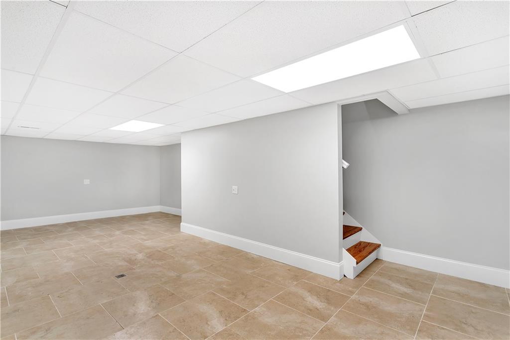 465 Edgewood Road Beaver Falls, PA 15010 - Photo 15 of 25 A finished basement provides ample room for a game room, out-of-the-way office, playroom - let your imagination run wild!