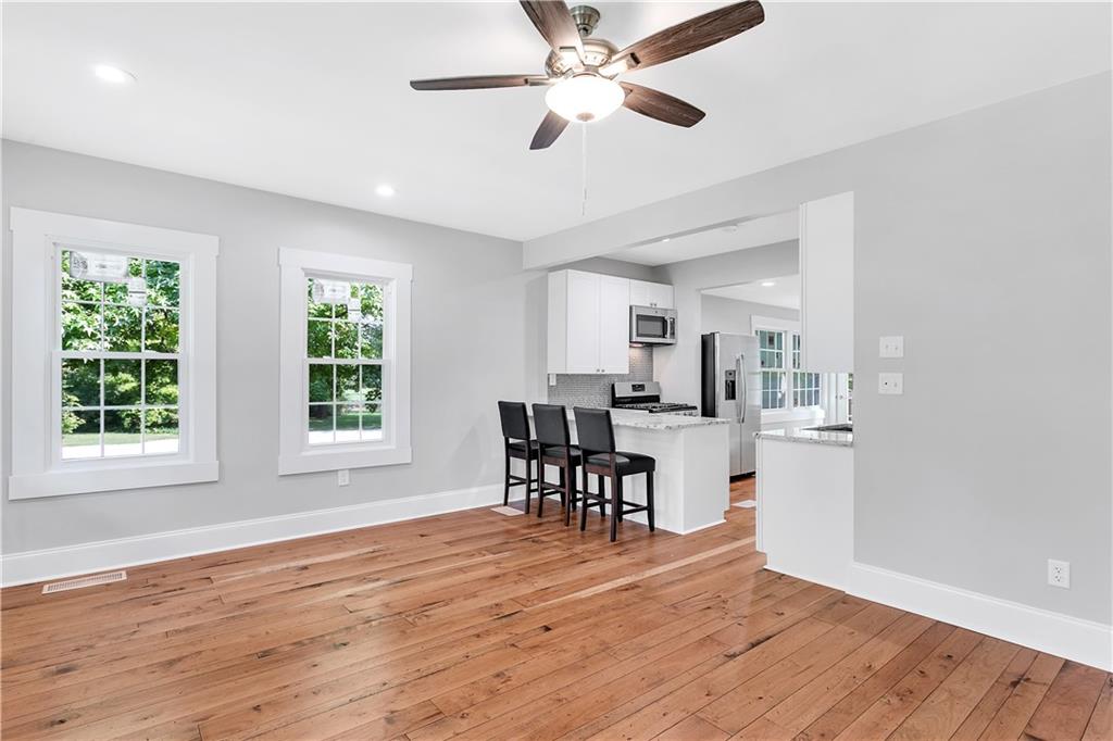 Stunning 3/4'' cherry hardwood gracefully underscores the first floor...