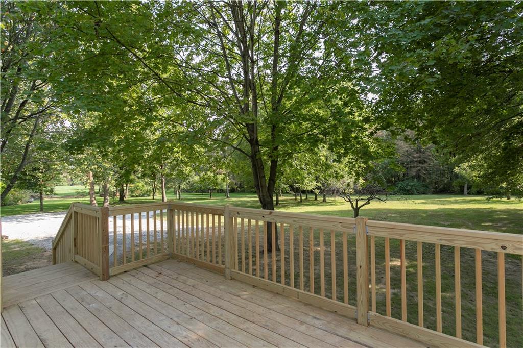 465 Edgewood Road Beaver Falls, PA 15010 - Photo 21 of 25 An expansive deck is the ideal overlook for your 2-acre property...