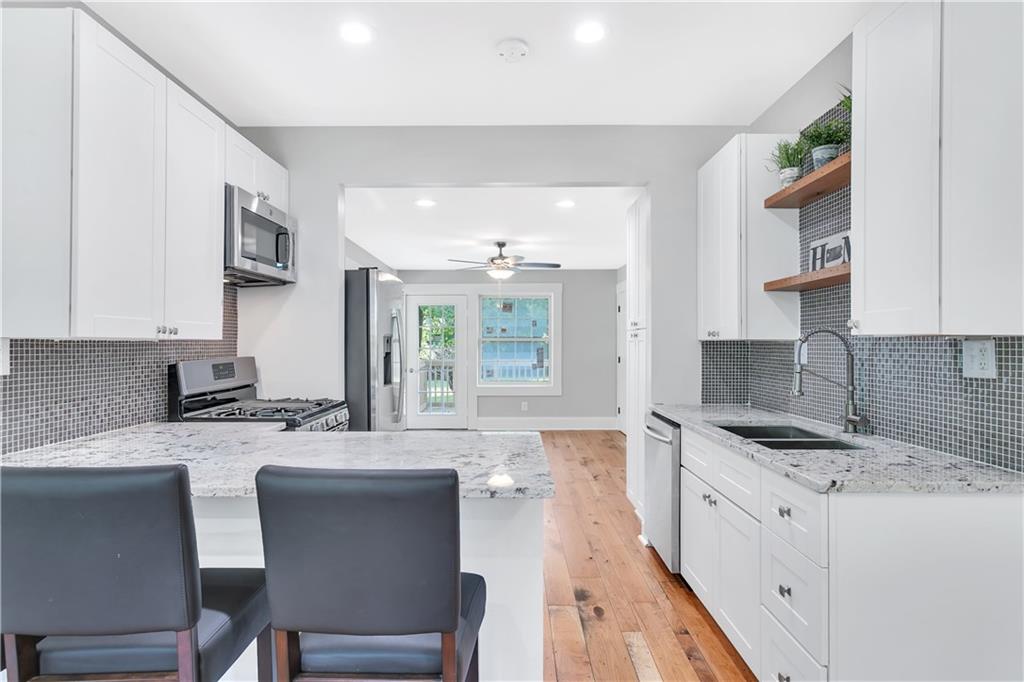Line of sight from the front door to the back showcases the spacious feel...