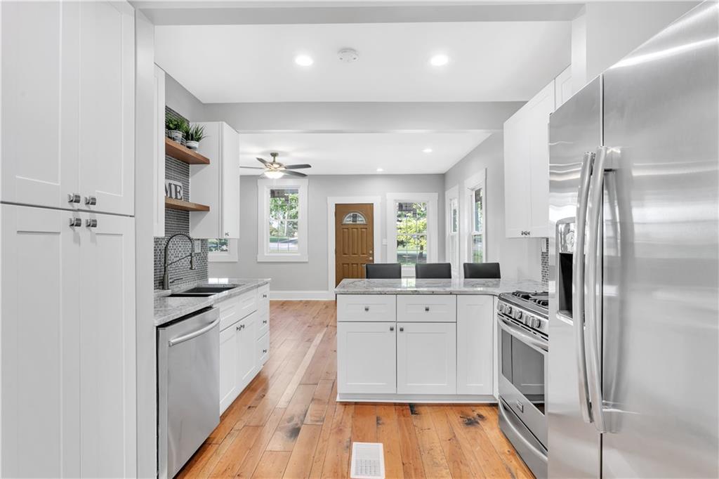 From the granite countertops to the stainless appliances to the soft close cabinets... this kitchen checks all the boxes...