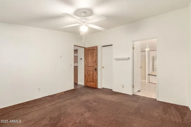 an empty room with a bathroom