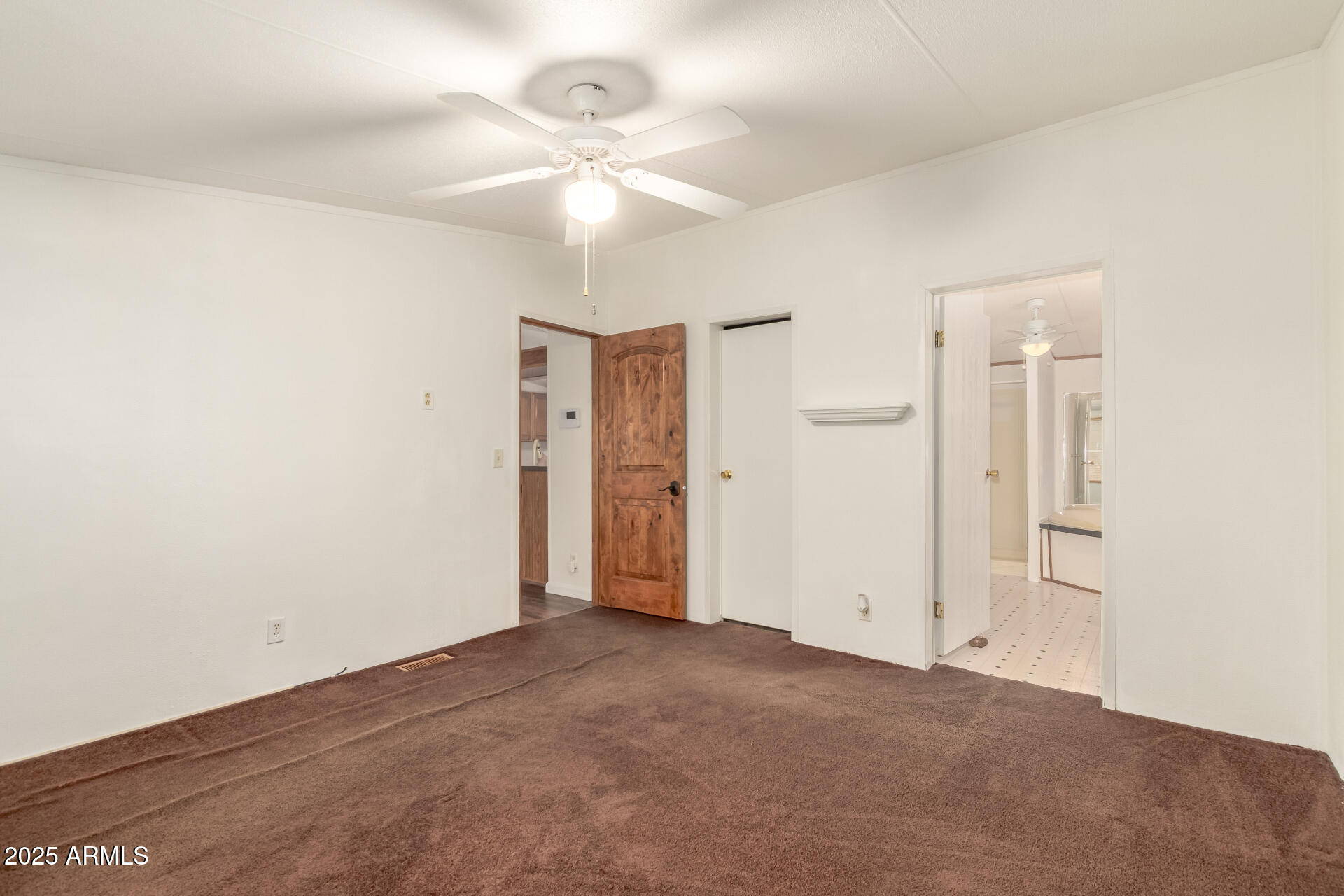 11404 West Custer Road Arizona City, AZ 85123 - Photo 11 of 27 an empty room with a bathroom