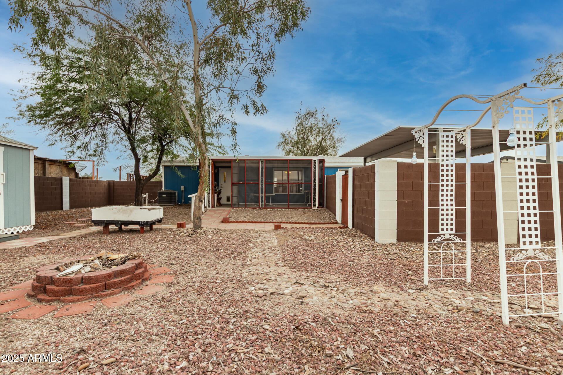 11404 West Custer Road Arizona City, AZ 85123 - Photo 24 of 27 a view of a house with backyard