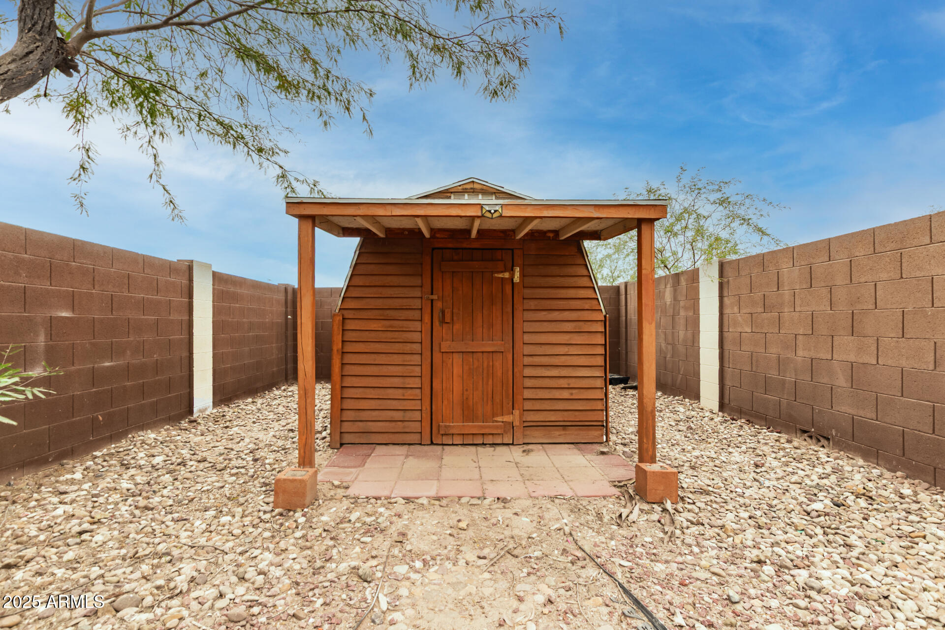 11404 West Custer Road Arizona City, AZ 85123 - Photo 25 of 27 a front view of a house with a yard