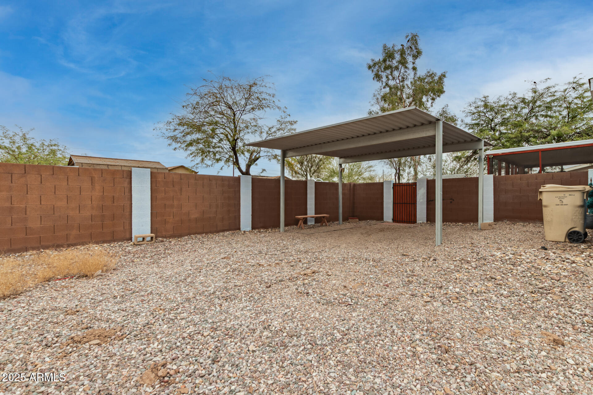 11404 West Custer Road Arizona City, AZ 85123 - Photo 27 of 27 a backyard of a house