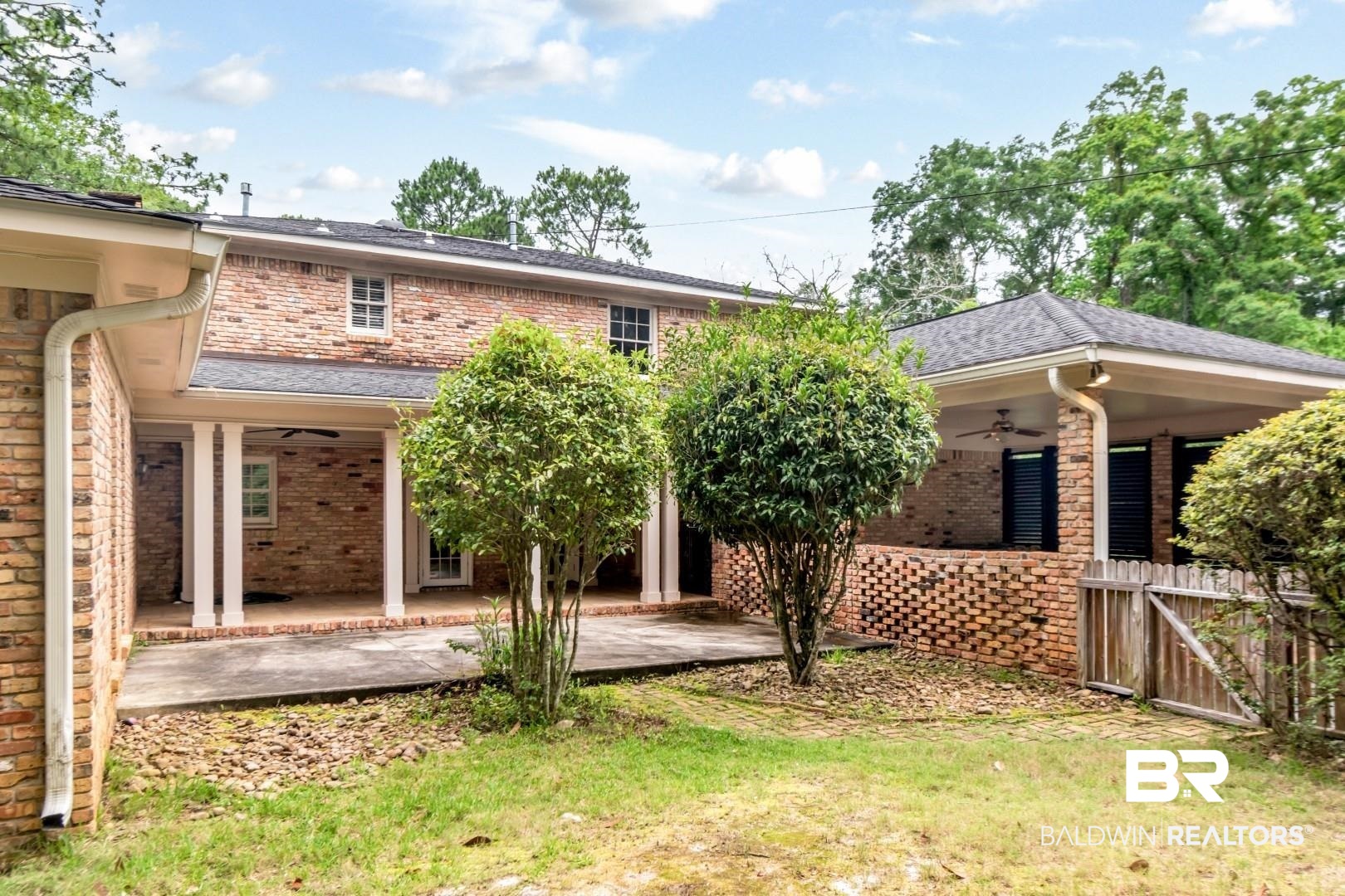 4776 Falls Church Road Mobile, AL 36608 - Photo 34 of 45 Brick exterior featuring multiple covered patios