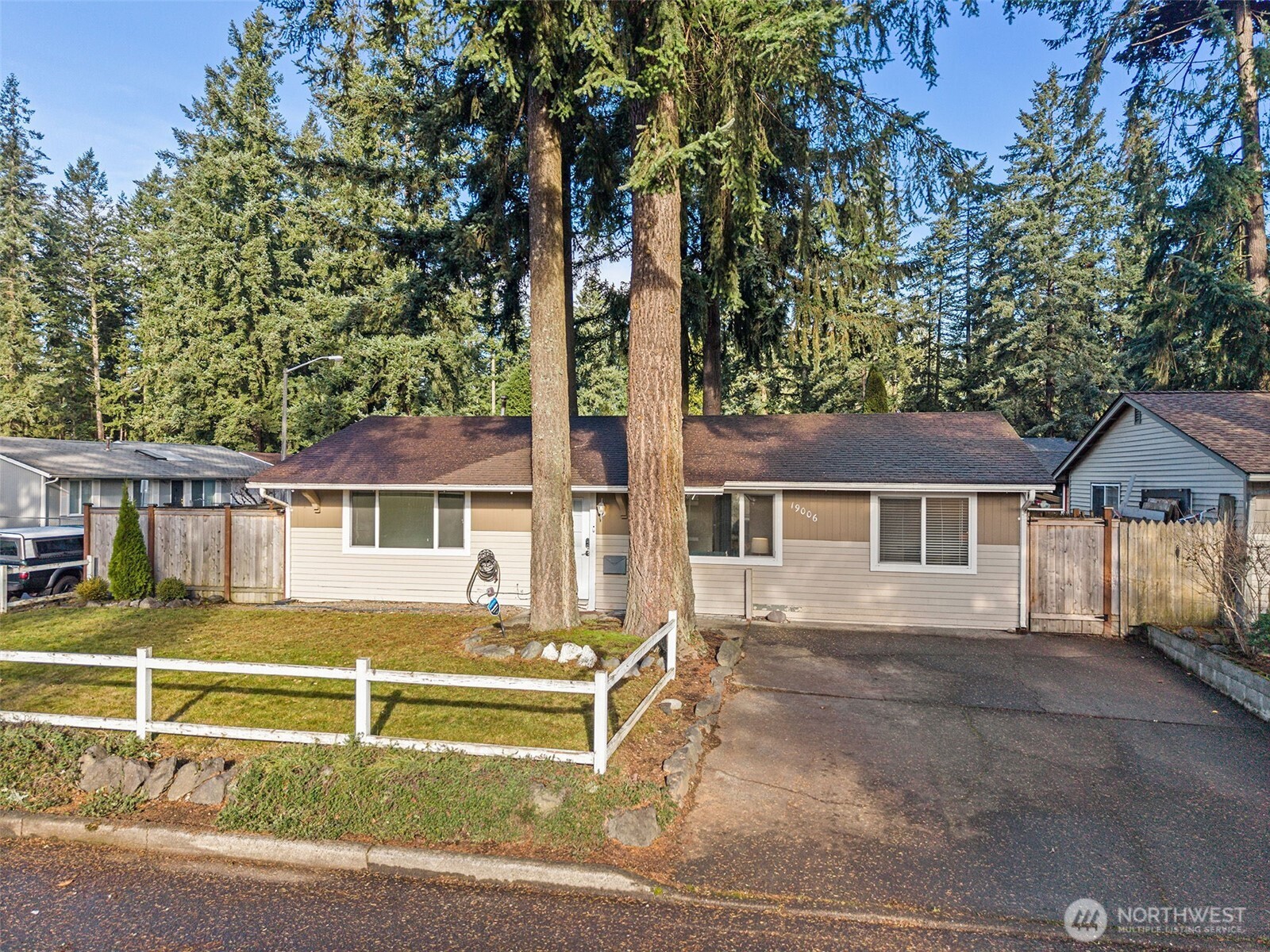 19006 Southeast 269th Street Covington, WA 98042 - Photo 1 of 32 front view of house with a yard