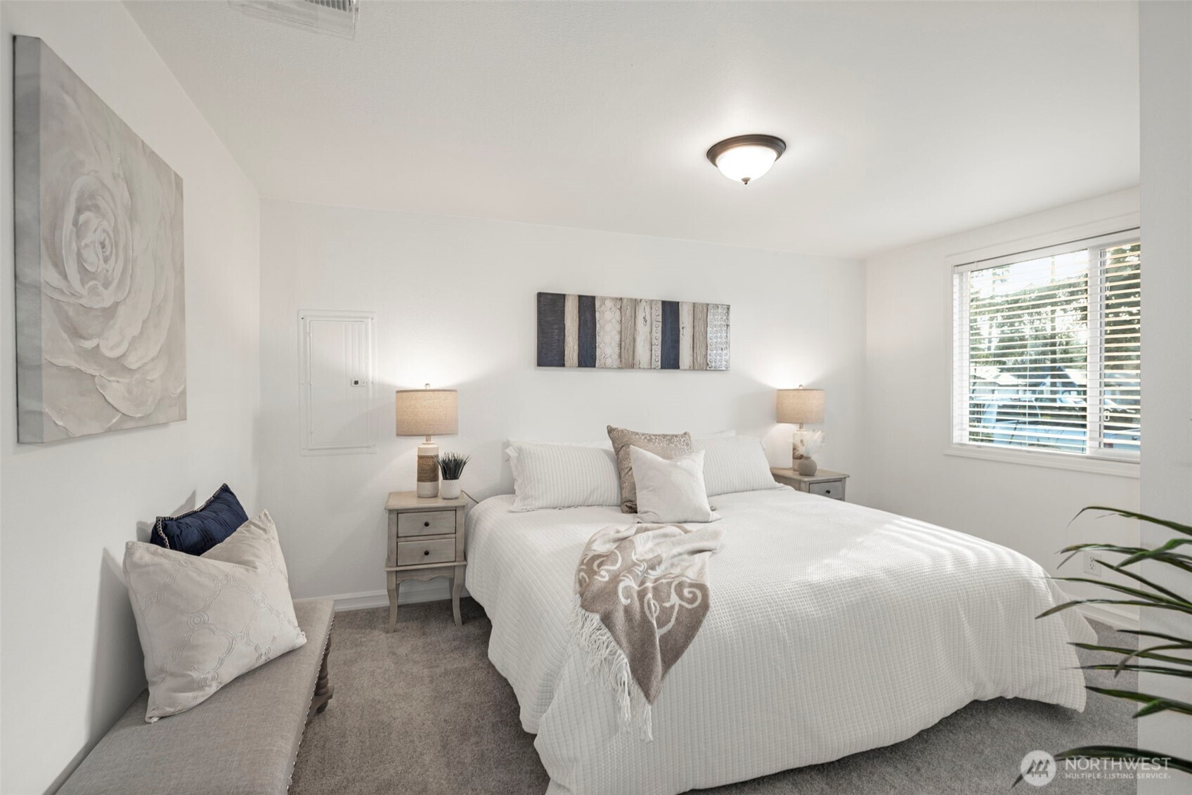 19006 Southeast 269th Street Covington, WA 98042 - Photo 11 of 32 a bedroom with a bed and a couch