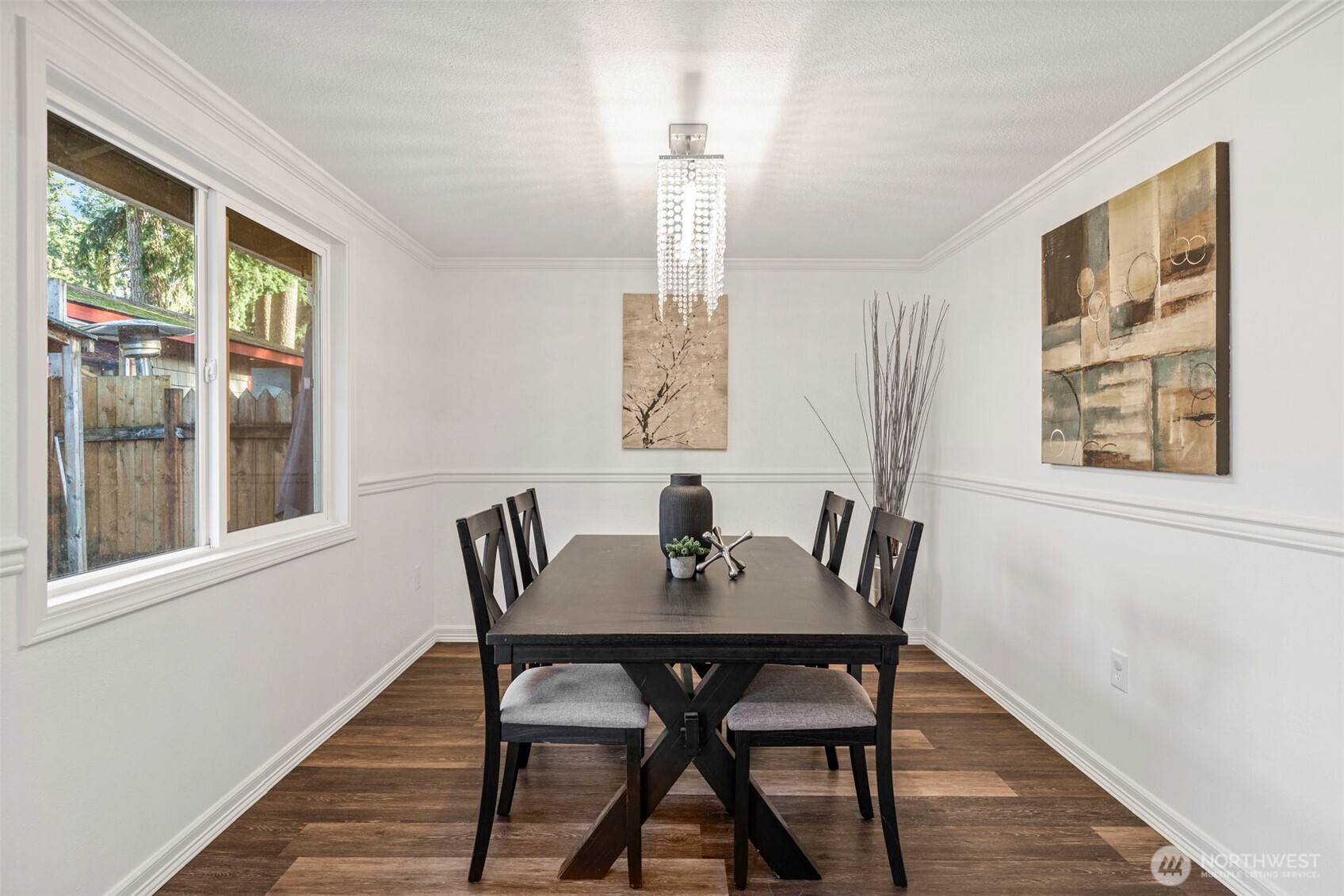 19006 Southeast 269th Street Covington, WA 98042 - Photo 14 of 32 a view of a dining room with furniture window and wooden floor