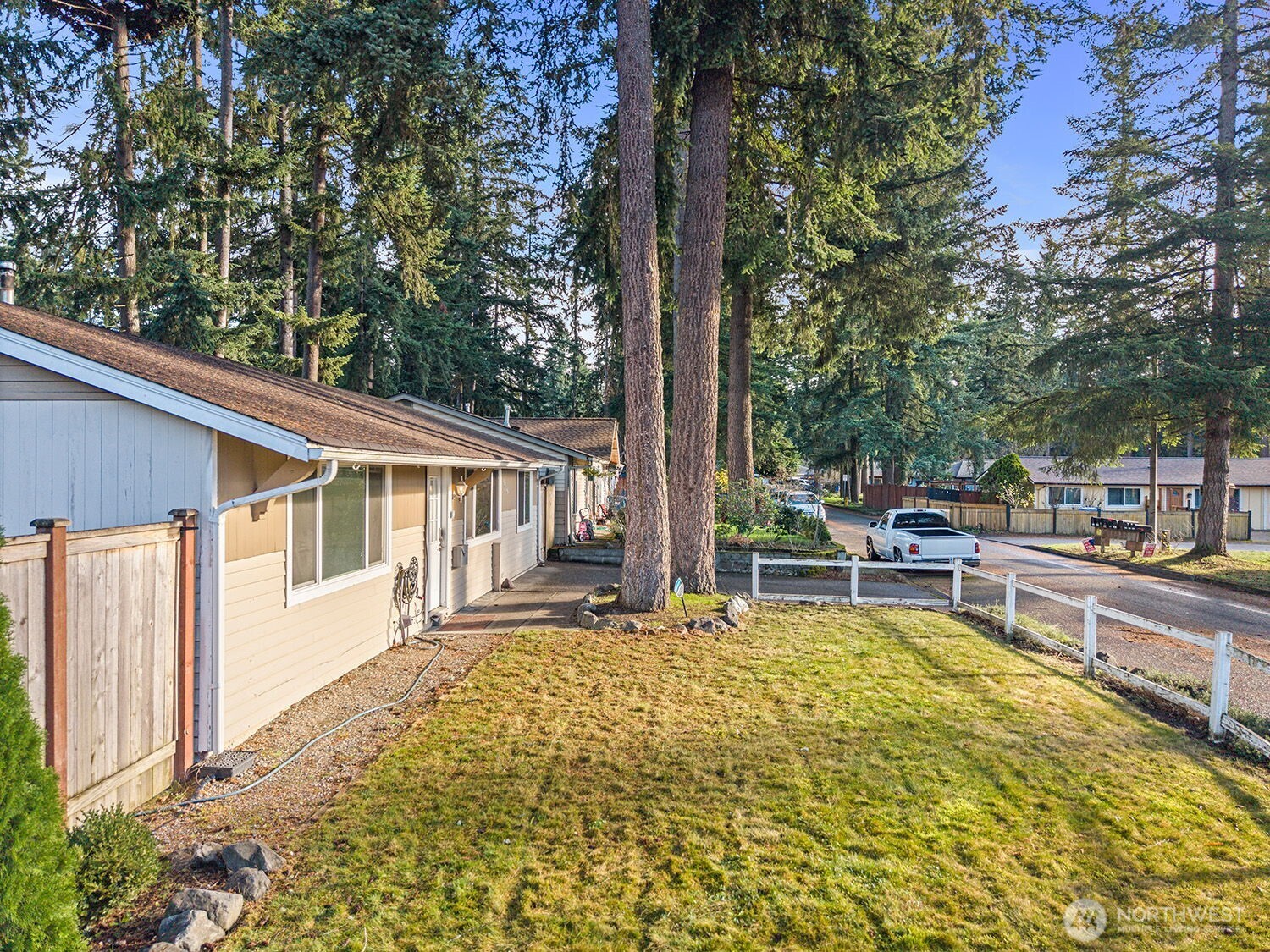 19006 Southeast 269th Street Covington, WA 98042 - Photo 26 of 32 a view of a house with backyard and sitting area