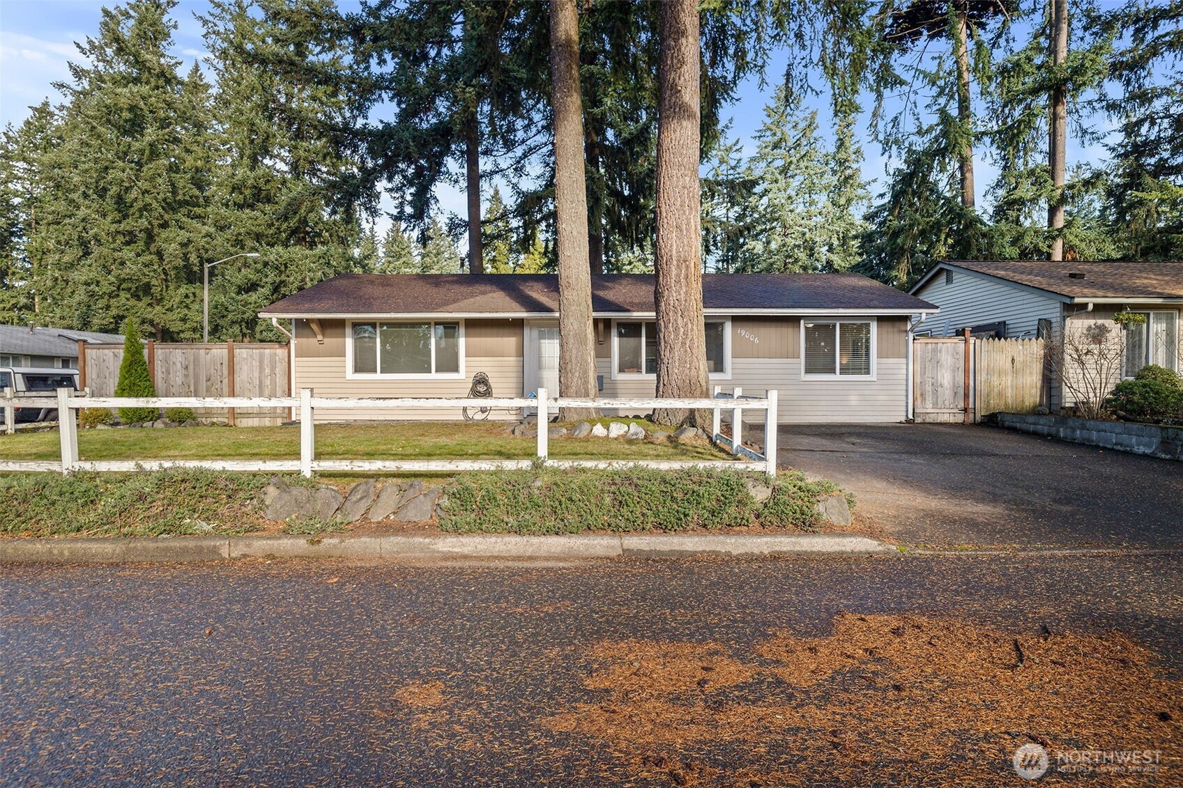 19006 Southeast 269th Street Covington, WA 98042 - Photo 29 of 32 front view of a house with a yard