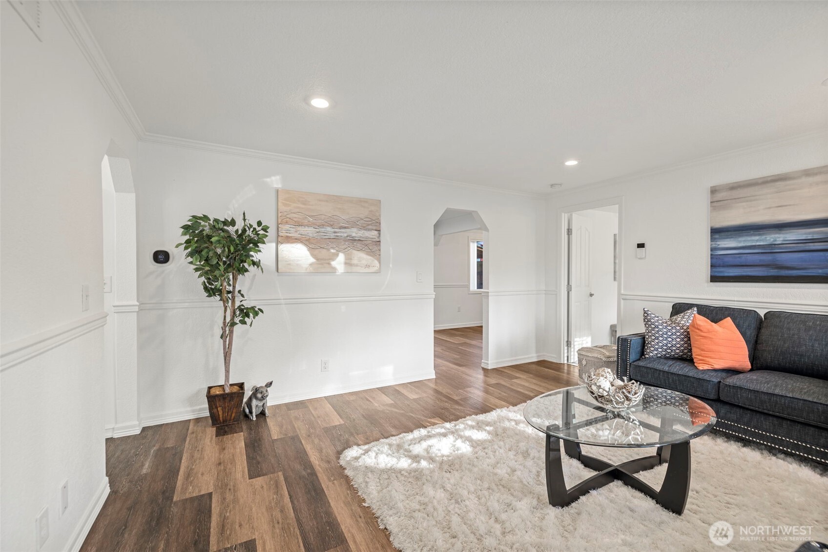 19006 Southeast 269th Street Covington, WA 98042 - Photo 4 of 32 a living room with furniture and a potted plant
