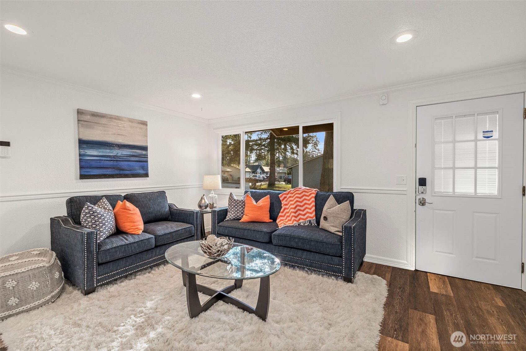 19006 Southeast 269th Street Covington, WA 98042 - Photo 5 of 32 a living room with furniture and a wooden floor