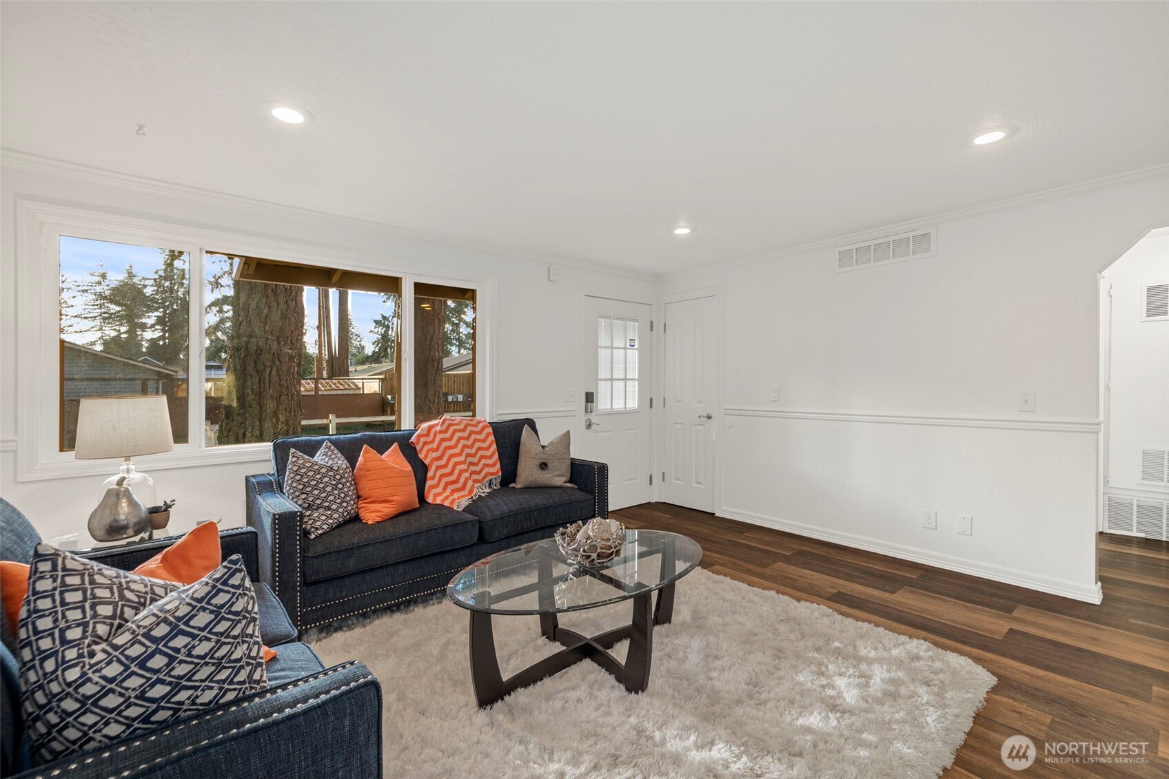 19006 Southeast 269th Street Covington, WA 98042 - Photo 6 of 32 a living room with furniture and a rug