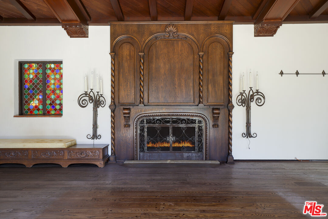 1851 Outpost Drive Los Angeles, CA 90068 - Photo 5 of 24 a living room with furniture and a fireplace