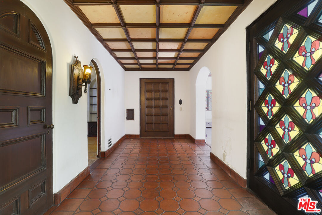 1851 Outpost Drive Los Angeles, CA 90068 - Photo 6 of 24 a view of entryway with stairs and wooden floor