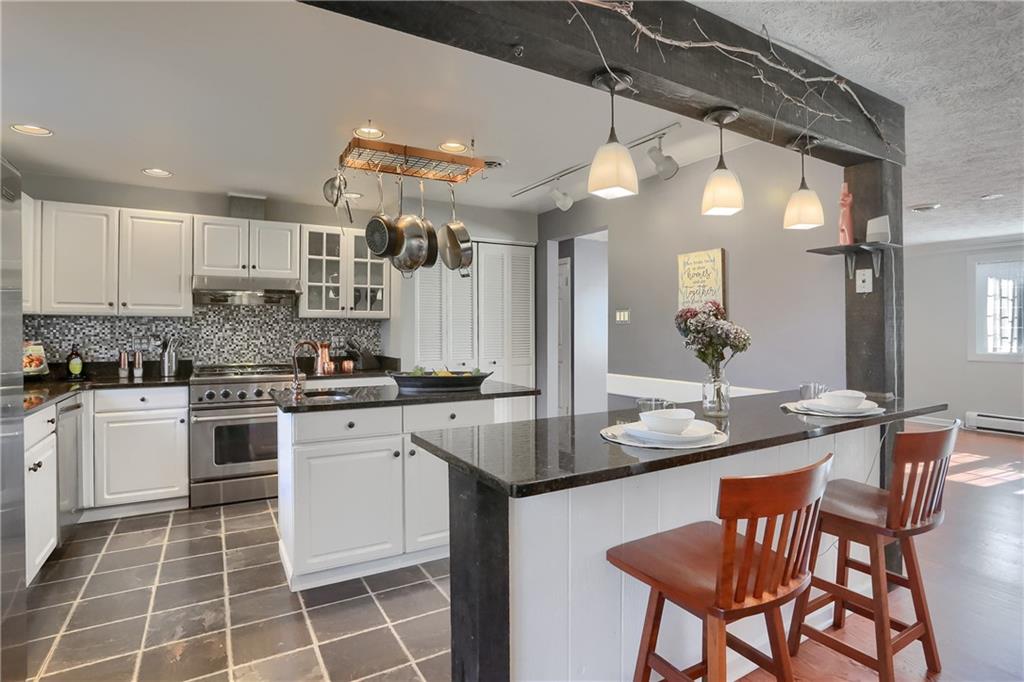 265 Shafer Road Moon Township, PA 15108 - Photo 12 of 50 a kitchen with a sink and cabinets