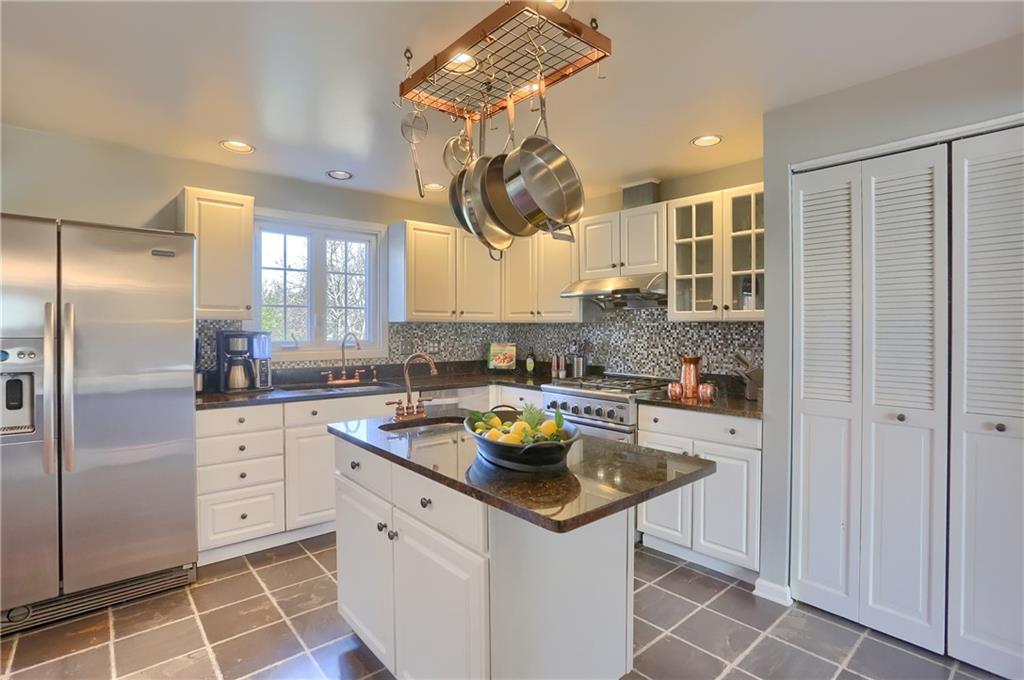265 Shafer Road Moon Township, PA 15108 - Photo 16 of 50 a kitchen with a sink appliances and cabinets