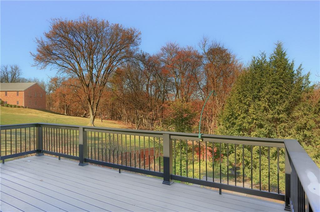 265 Shafer Road Moon Township, PA 15108 - Photo 19 of 50 a view of a balcony with wooden floor and fence