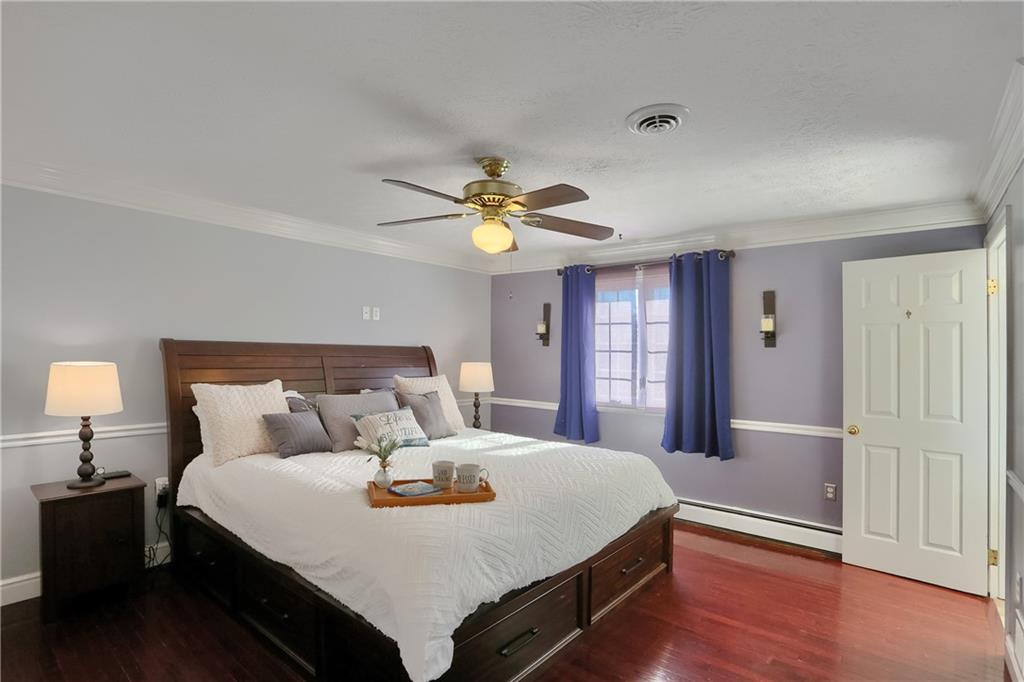 265 Shafer Road Moon Township, PA 15108 - Photo 22 of 50 a bed room with a bed and a chandelier