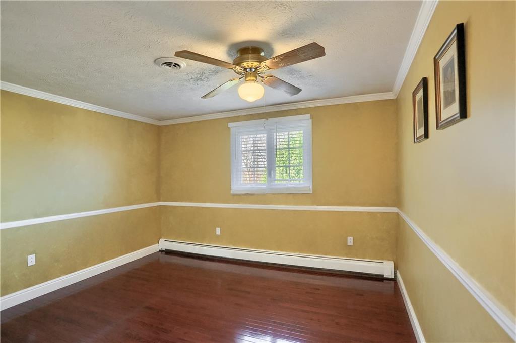 265 Shafer Road Moon Township, PA 15108 - Photo 27 of 50 a view of an empty room with wooden floor and a window