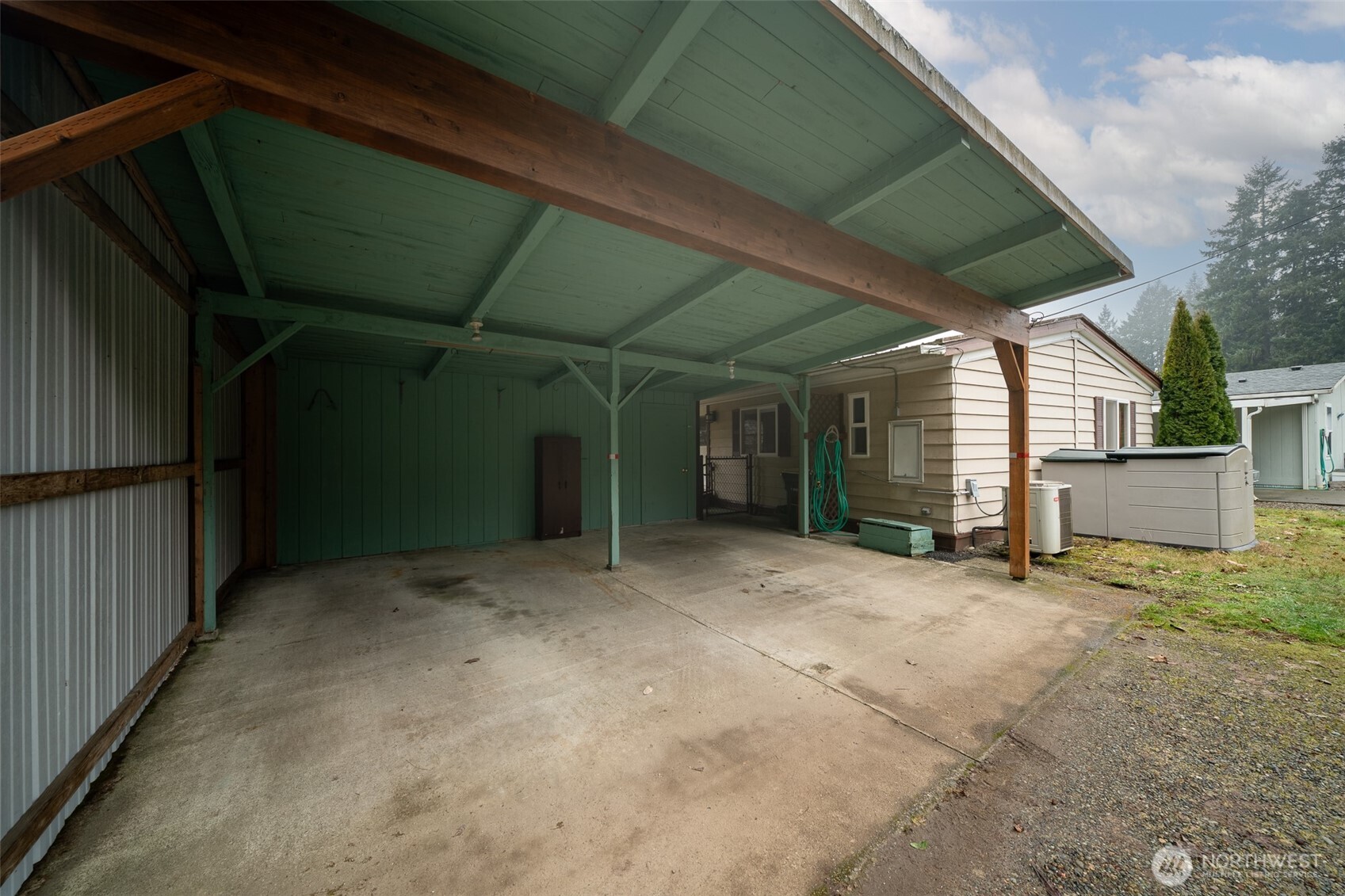 930 Trosper Road Southwest, Unit 43 Tumwater, WA 98512 - Photo 25 of 26 a view of a house with a green space