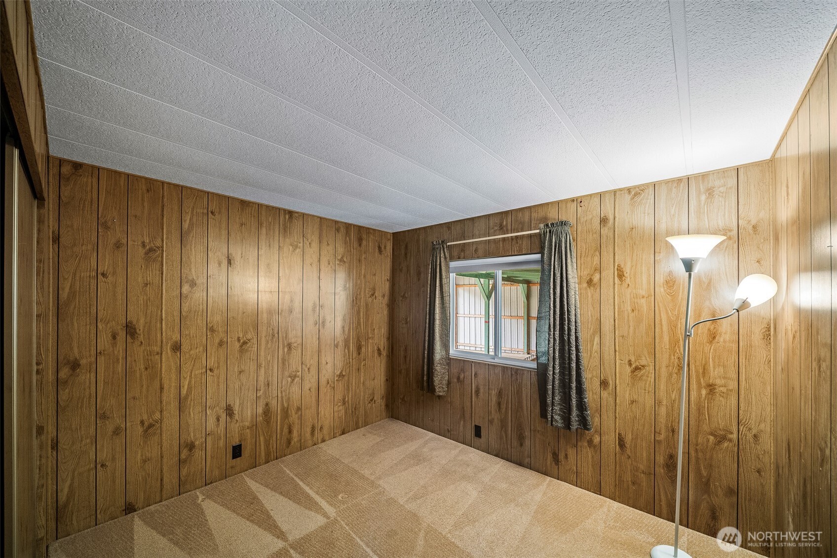 930 Trosper Road Southwest, Unit 43 Tumwater, WA 98512 - Photo 10 of 26 a view of a hallway with wooden floor