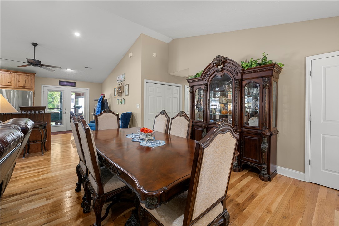 304 West A 144 Walhalla, SC 29691 - Photo 11 of 43 This inviting dining area features rich wood flooring and vaulted ceilings, perfect for memorable gatherings.
