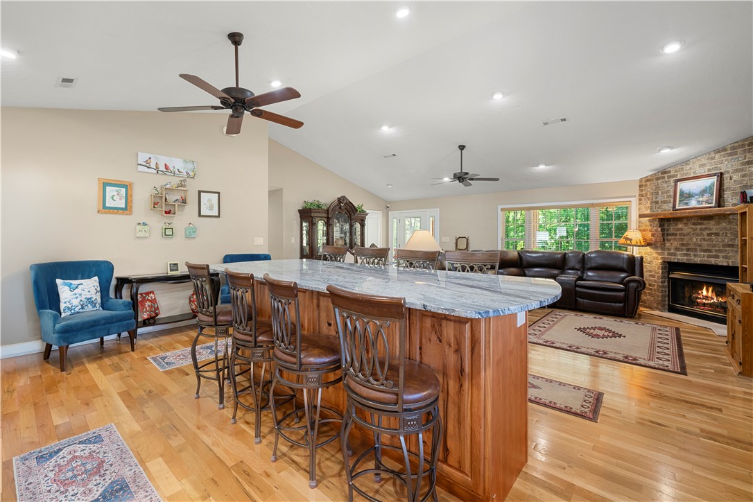 304 West A 144 Walhalla, SC 29691 - Photo 16 of 43 This bright interior features an inviting open-concept design and a charming fireplace.