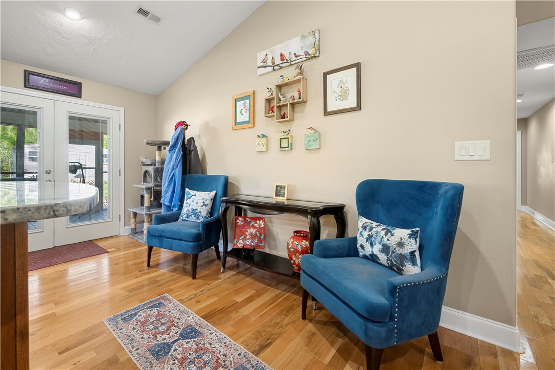 304 West A 144 Walhalla, SC 29691 - Photo 20 of 43 This inviting interior features a soaring vaulted ceiling and elegant hardwood floors.