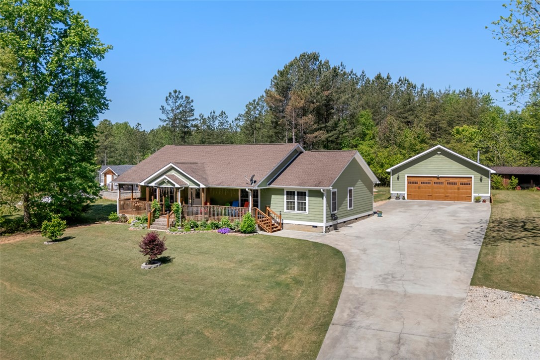304 West A 144 Walhalla, SC 29691 - Photo 2 of 43 This inviting ranch-style home features a spacious front porch and a detached garage.