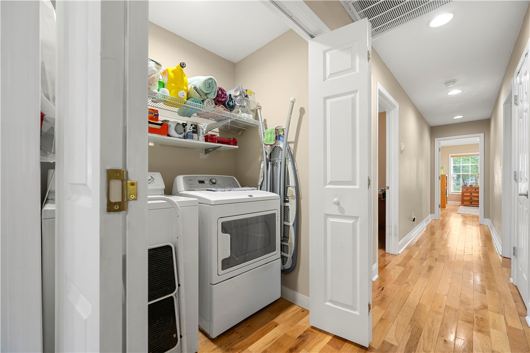 304 West A 144 Walhalla, SC 29691 - Photo 21 of 43 Practical laundry area with sleek appliances offers convenience and direct access to the inviting hallway.