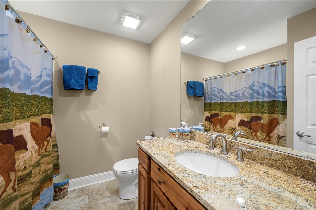 304 West A 144 Walhalla, SC 29691 - Photo 23 of 43 This bathroom features a sleek vanity with ample counter space and convenient storage.