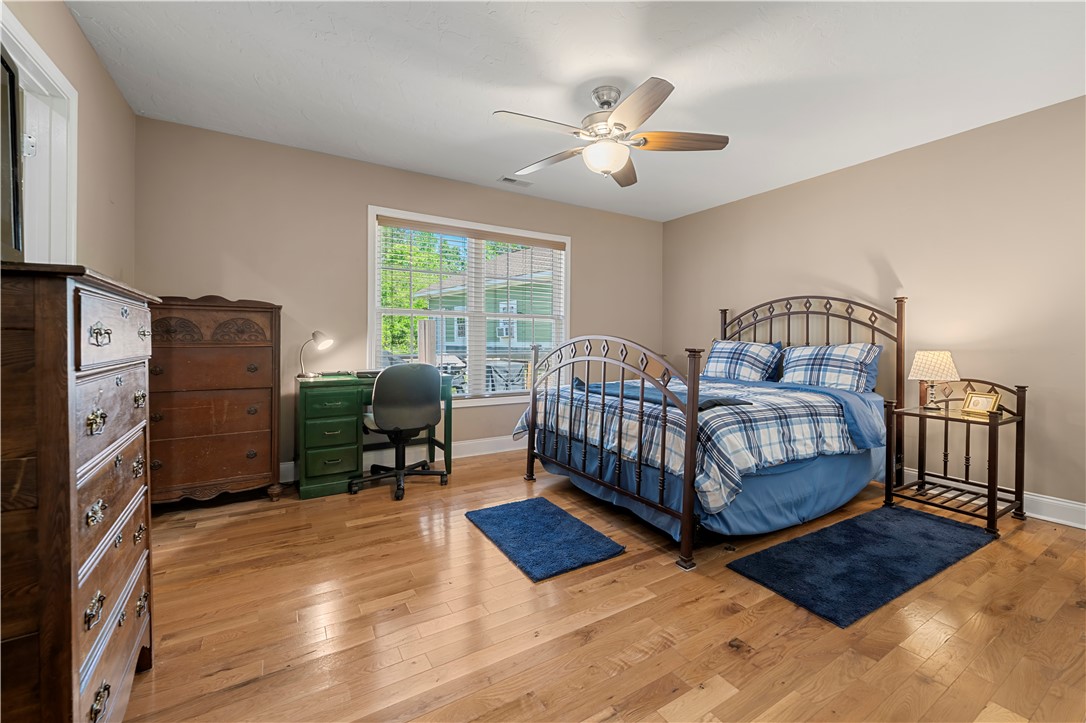 304 West A 144 Walhalla, SC 29691 - Photo 25 of 43 This cozy bedroom features hardwood floors and ample natural light, perfect for restful living.