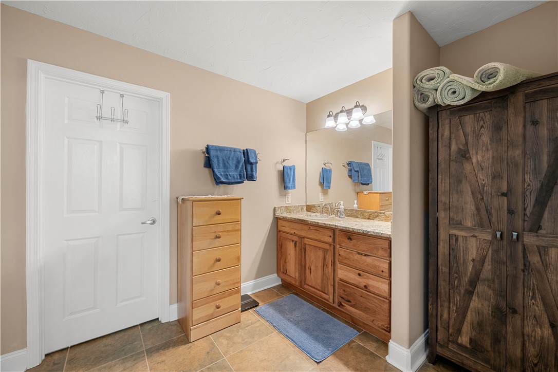 304 West A 144 Walhalla, SC 29691 - Photo 30 of 43 This bathroom features ample storage and a double vanity, offering both style and functionality.