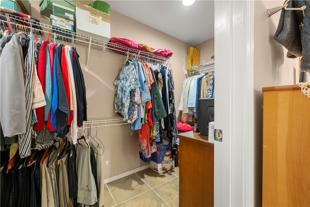 304 West A 144 Walhalla, SC 29691 - Photo 32 of 43 This spacious walk-in closet features ample shelving and hanging space, keeping everything organized and accessible.