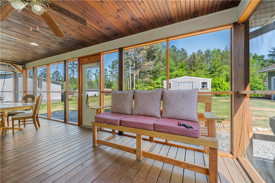 304 West A 144 Walhalla, SC 29691 - Photo 35 of 43 Relax and unwind in this inviting screened-in porch, offering a seamless blend of indoor comfort and outdoor serenity.