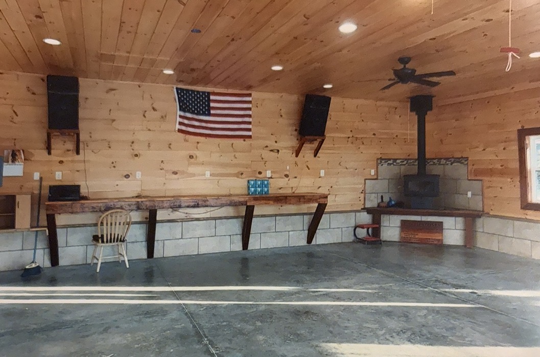 304 West A 144 Walhalla, SC 29691 - Photo 38 of 43 This spacious interior features natural wood paneling and a cozy fireplace, perfect for gatherings.