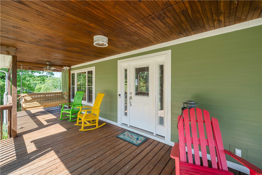 304 West A 144 Walhalla, SC 29691 - Photo 4 of 43 This inviting porch, with its wooden details and comfortable seating, is an ideal space for relaxation.