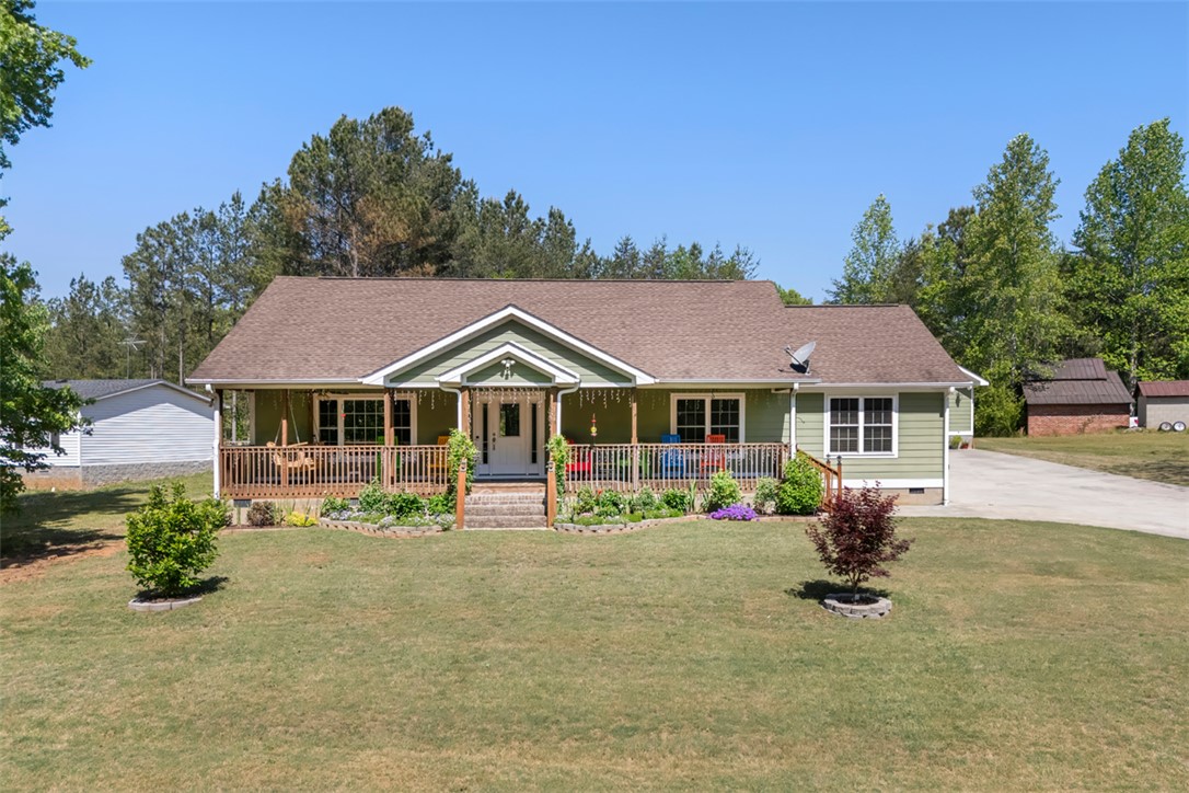 304 West A 144 Walhalla, SC 29691 - Photo 42 of 43 This charming home features a welcoming porch, perfect for enjoying peaceful outdoor moments.