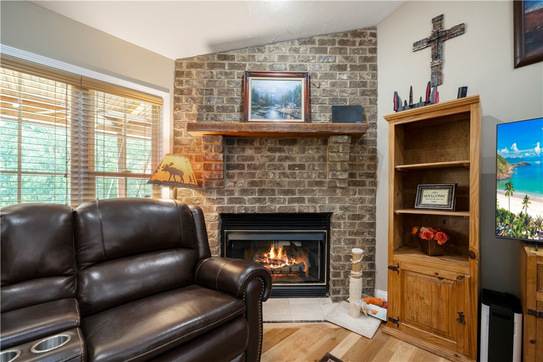 304 West A 144 Walhalla, SC 29691 - Photo 7 of 43 This inviting living space features a cozy fireplace, perfect for relaxing evenings.