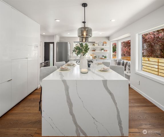 a bedroom with a bed and a fireplace