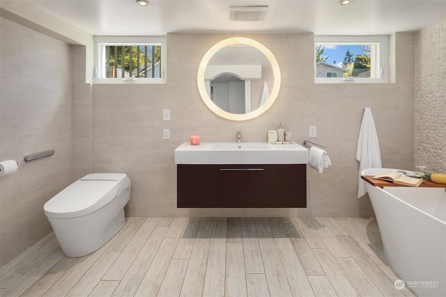 a view of a room with wooden floor and stairs