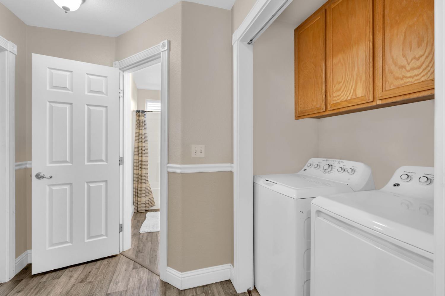 1406 San Rafael Street Los Banos, CA 93635 - Photo 16 of 35 a view of storage and utility room with a utility room