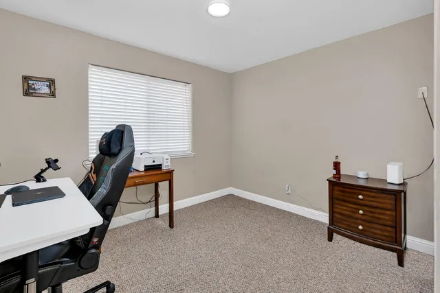 a room with furniture and wooden floor