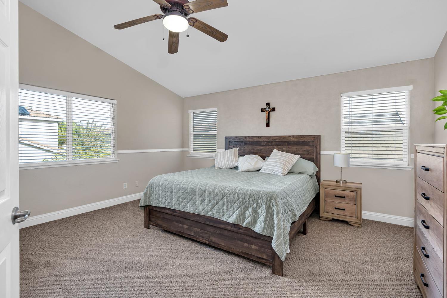 1406 San Rafael Street Los Banos, CA 93635 - Photo 22 of 35 a bedroom with a bed and window