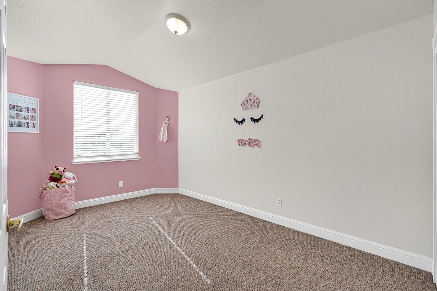 1406 San Rafael Street Los Banos, CA 93635 - Photo 26 of 35 an empty room with a window