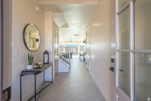 2972 West 570 North Hurricane, UT 84737 - Photo 13 of 104 Hallway with recessed lighting and light tile patterned flooring