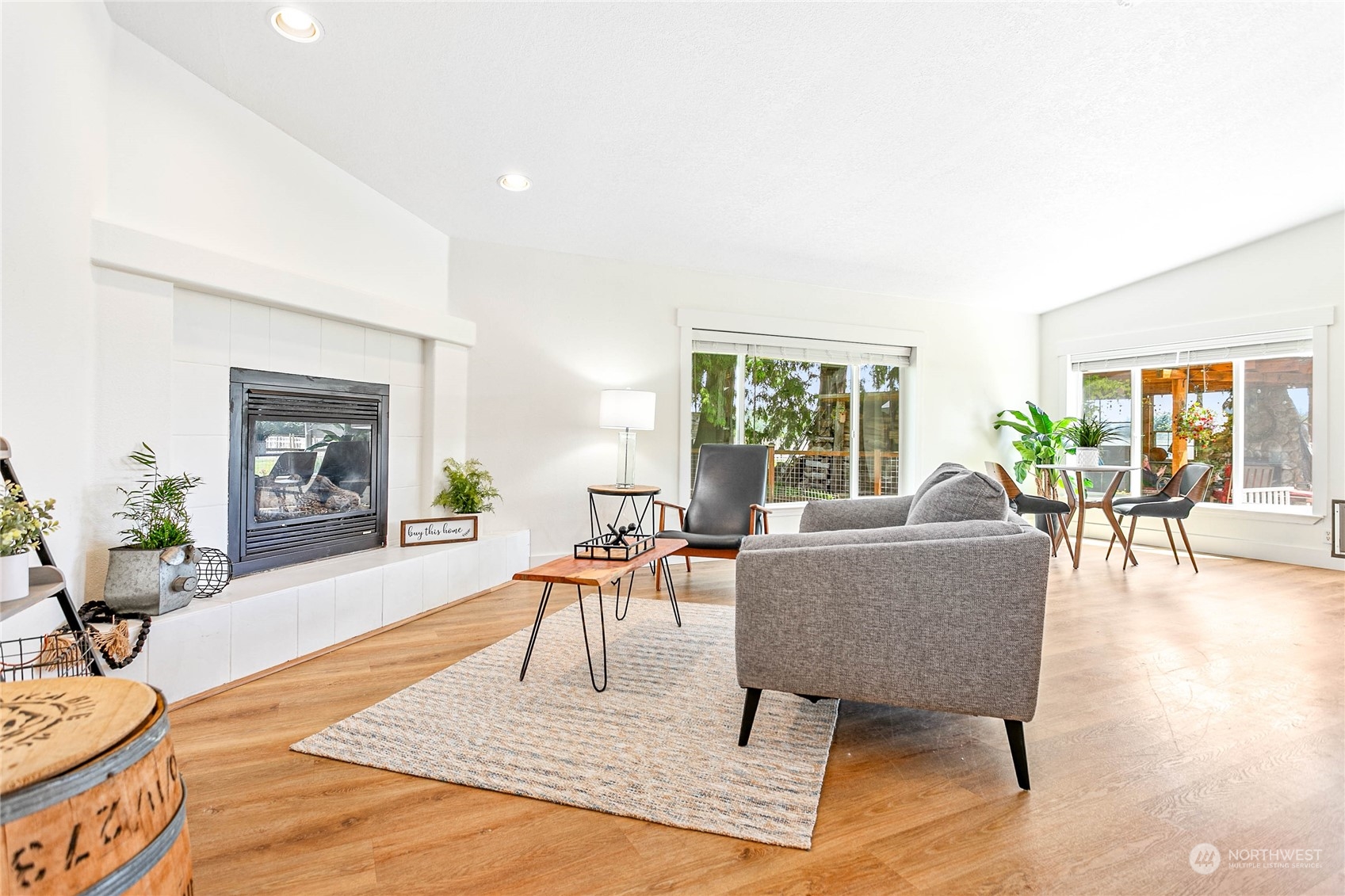 8338 Bob Hall Road Lynden, WA 98264 - Photo 11 of 37 a living room with furniture and a wooden floor